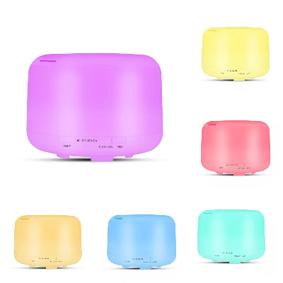 Aroma difuzer ovlazivac vazduha 500ml u razlicitim bojama LED svetla na beloj pozadini.