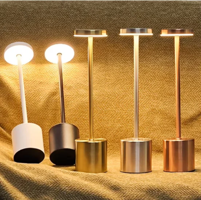 bezicne prenosne lampe razne boje belo srebrno zlatno bronzano enterijer