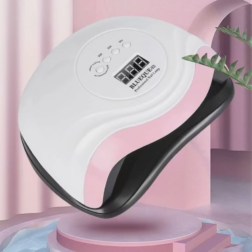 Profesionalna Blueque V7 UV LED lampa za nokte u elegantnoj belo-roza boji, savrsena za brzo susenje gel laka i nadogradnje noktiju.