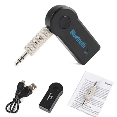Bluetooth adapter i prijemnik zvuka sa dodacima. Prikaz usb kabla, uputstva za upotrebu i metalnog audio adaptera.