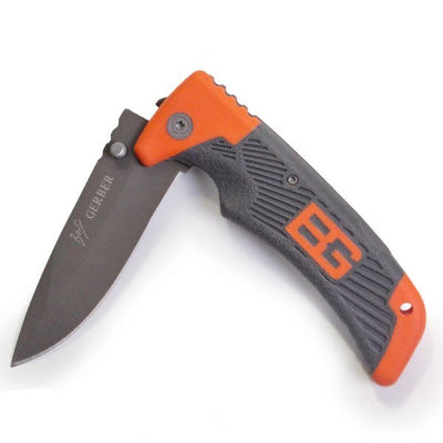 Gerber preklopni noz sa narandzastom drskom, idealan za kampovanje, planinarenje i aktivnosti u prirodi.