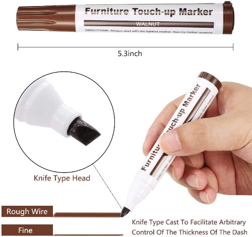 Detaljan prikaz markera za popravku namestaja boje orah (Walnut). Gornji deo slike prikazuje ceo marker sa braon cepom i etiketom "Furniture Touch-up Marker WALNUT", kao i njegovu duzinu od 5.3 inca. Donji levi deo prikazuje uvećan vrh markera, označen kao "Knife Type Head". Pored njega su prikazane linije "Rough Wire" (gruba linija) i "Fine" (tanka linija) nacrtane markerom. Donji desni deo prikazuje ruku koja drzi marker i crta tanku liniju, sa tekstom "Knife Type Cast To Facilitate Arbitrary Control Of T