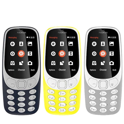 Prikaz klasicnih Nokia 3310 telefona u razlicitim bojama: teget, zuta i siva. Pouzdani mobilni telefoni za svakodnevnu upotrebu.