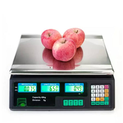 Tri crvene jabuke na digitalnoj vagi koja pokazuje težinu 0.075 kg, jediničnu cenu 6.50 i ukupnu cenu 0.49.