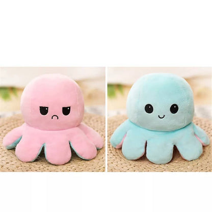 Plisana hobotnica pink i tirkizna igracka za izrazavanje raspolozenja reverzibilna