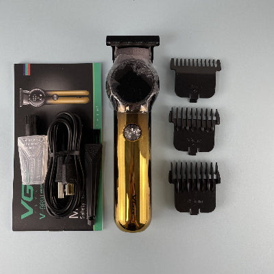 Zlatna VGR masinica za sisanje sa LED ekranom, izvadjena iz pakovanja. Prikazani su i dodaci koji dolaze uz masinicu: kabl, cesljici i ostali pribor.