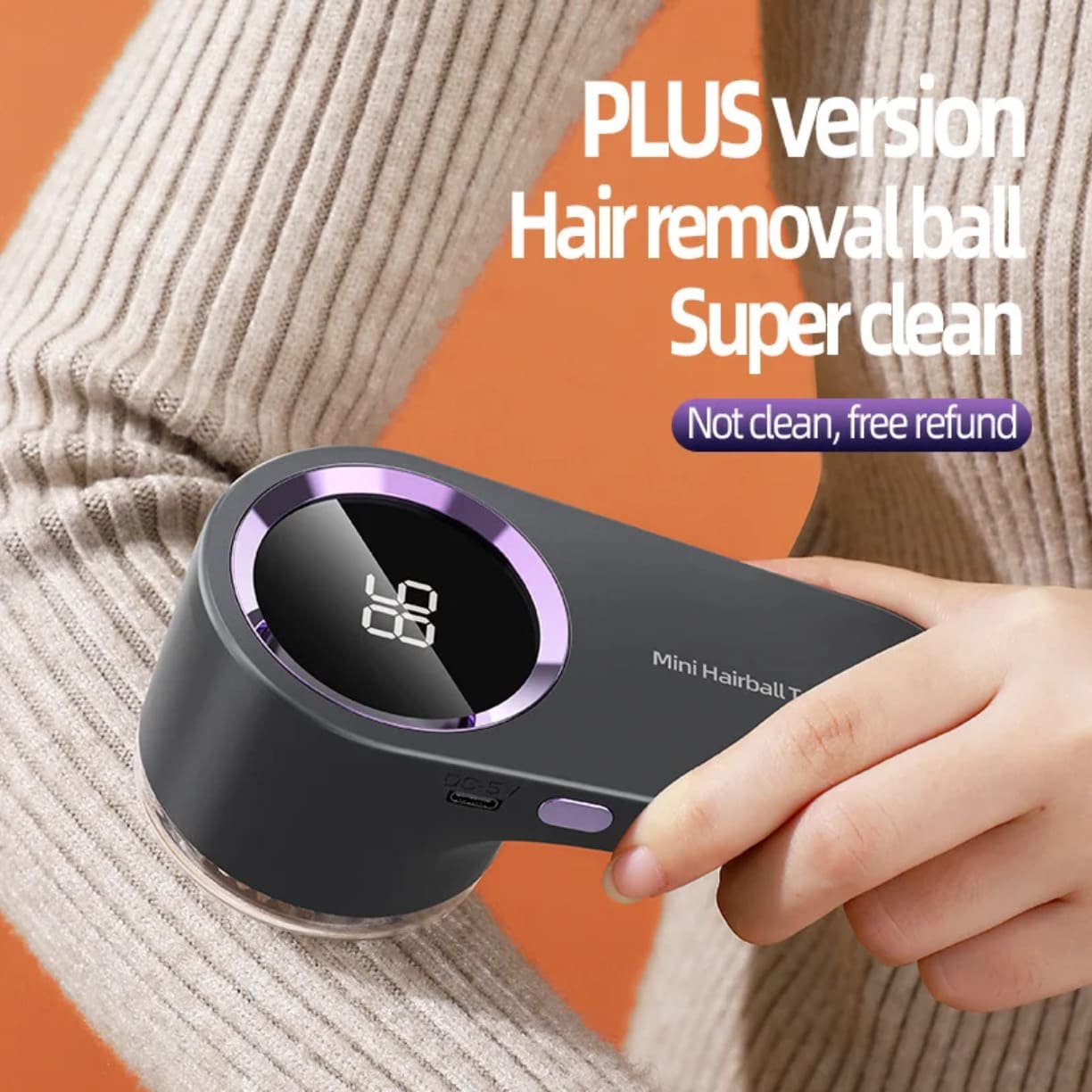 Rucni aparat za sisanje dzempera i odece tokom efikasnog ciscenja rukava trikotaze na modelu