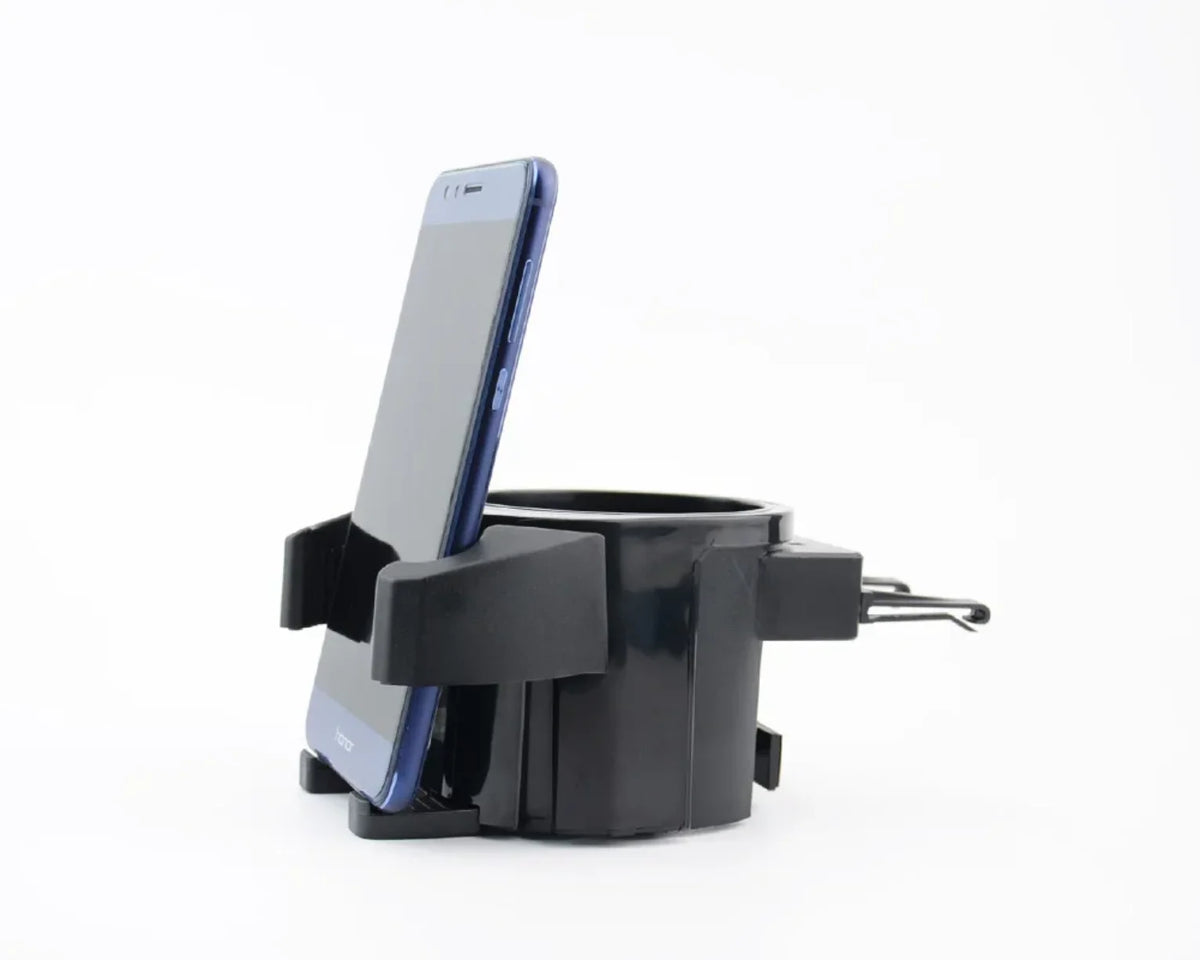 Univerzalni auto drzac drzi telefon iznad otvora za casu