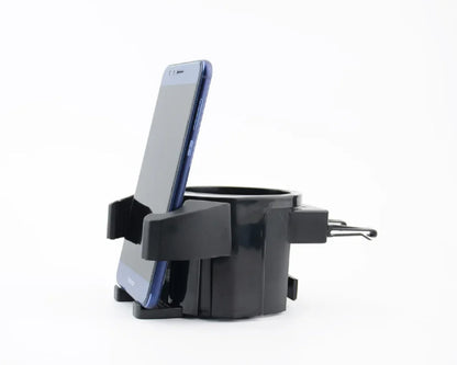 Univerzalni auto drzac drzi telefon iznad otvora za casu