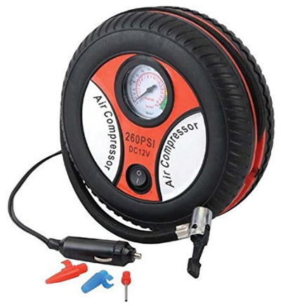 Prenosni auto kompresor sa 12V prikljuckom za auto upaljac. Ima analogni manometar i dodatne nastavke za pumpanje raznih predmeta.