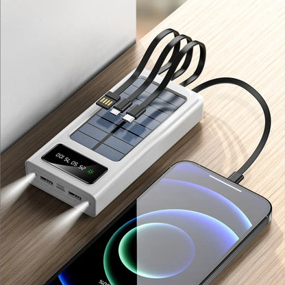 Beli solarni power bank sa ukljucenom LED lampom i povezanim telefonom
