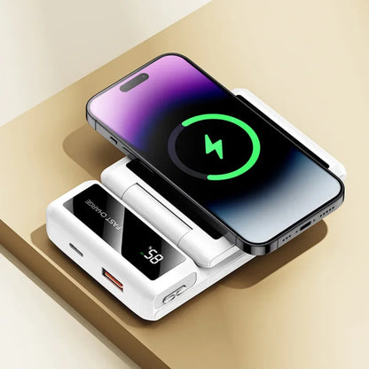 Telefon se bezicno puni na belom preklopnom power banku