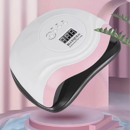 Profesionalna Blueque V7 UV LED lampa za nokte u elegantnoj belo-roza boji, savrsena za brzo susenje gel laka i nadogradnje noktiju.