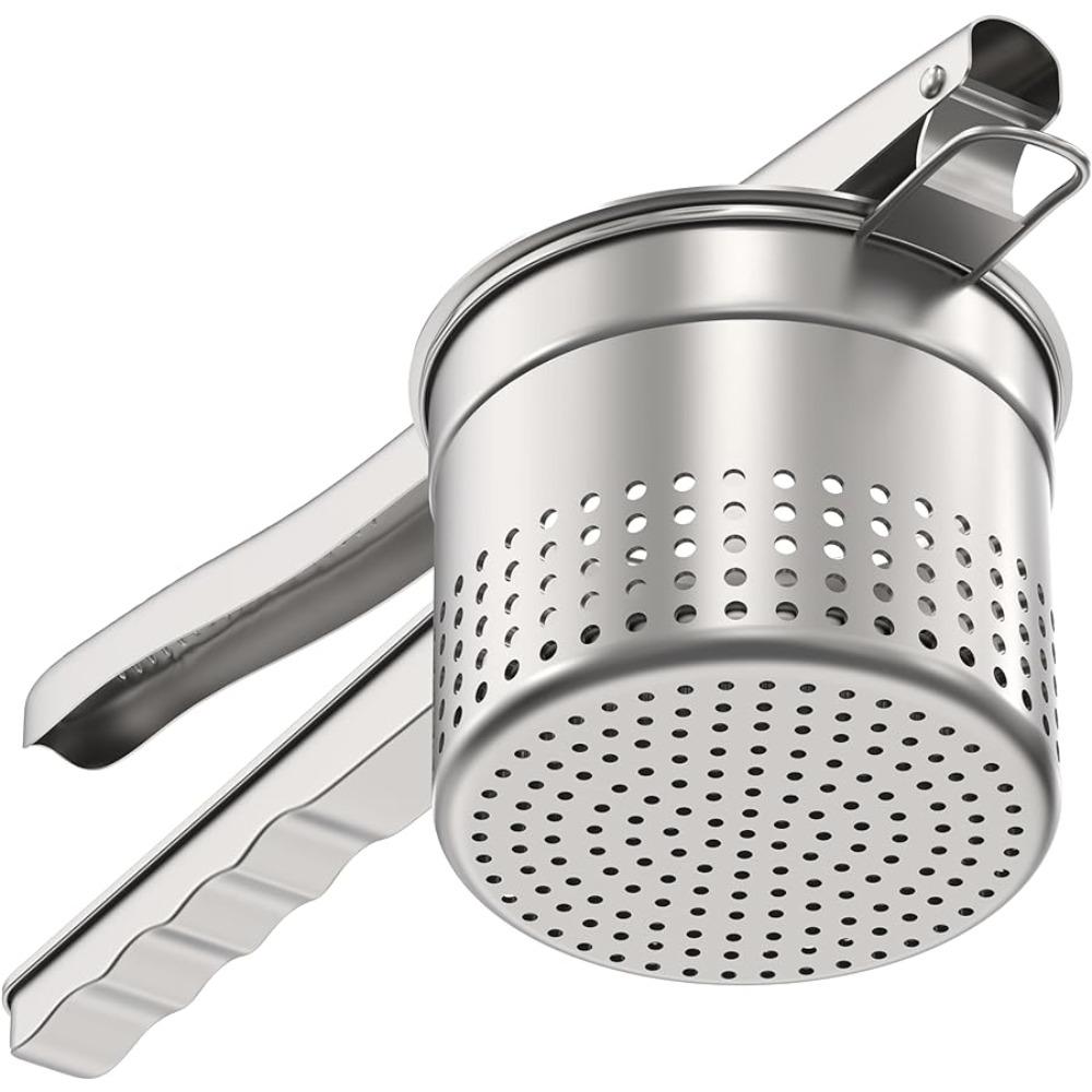 Bocni prikaz prazne prese za krompir od nerdjajuceg celika sa podignutom ruckom