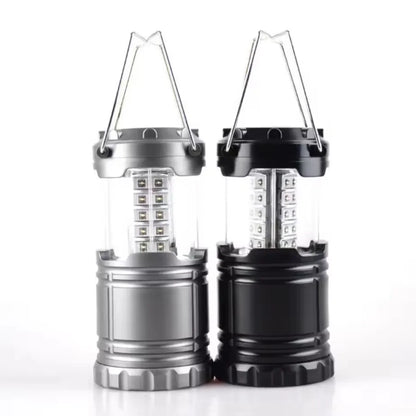 crna i siva kamperska led lampa otvorene