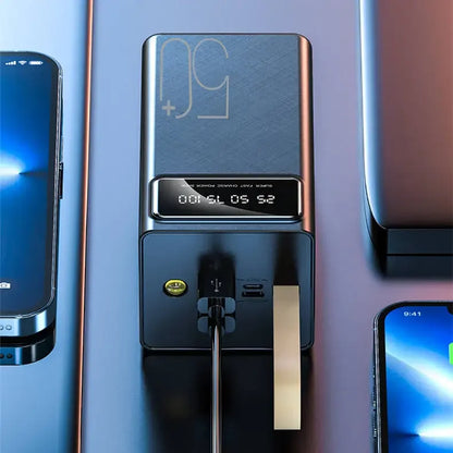 Crni prenosni punjac povezan sa telefonom preko USB kabla