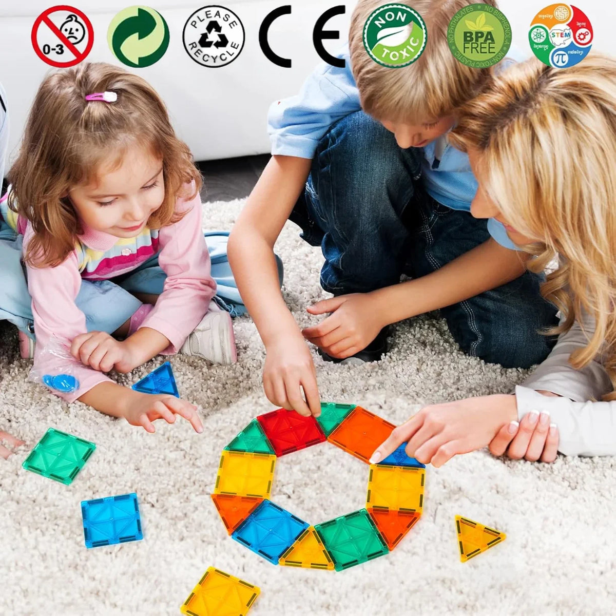 deca slazu sarene magnetne plocice na tepihu