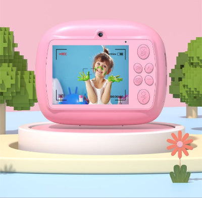 Roza decija kamera za trenutno stampanje slika sa ekranom za pregled i selfie opcijom. Odlicna spravica za decu, lako se koristi.