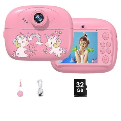 Prikaz obe strane roze decije instant kamere sa stampanjem. Ukljucuje USB kabl, vezicu i 32GB memorijsku karticu.