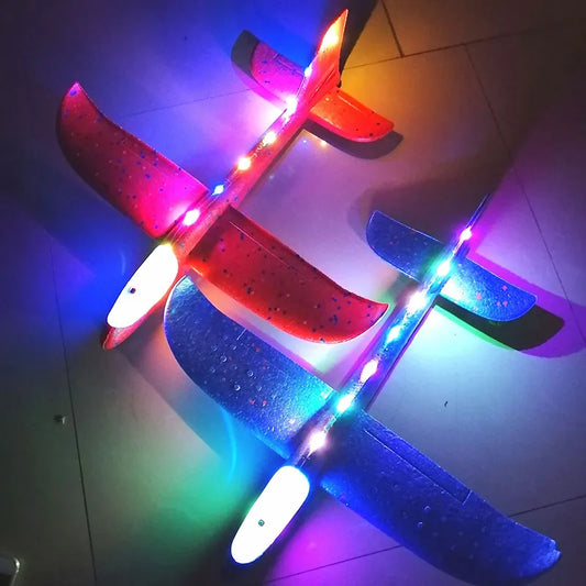 svetleca igracka avion od epp pene crveni i plavi sa led diodama