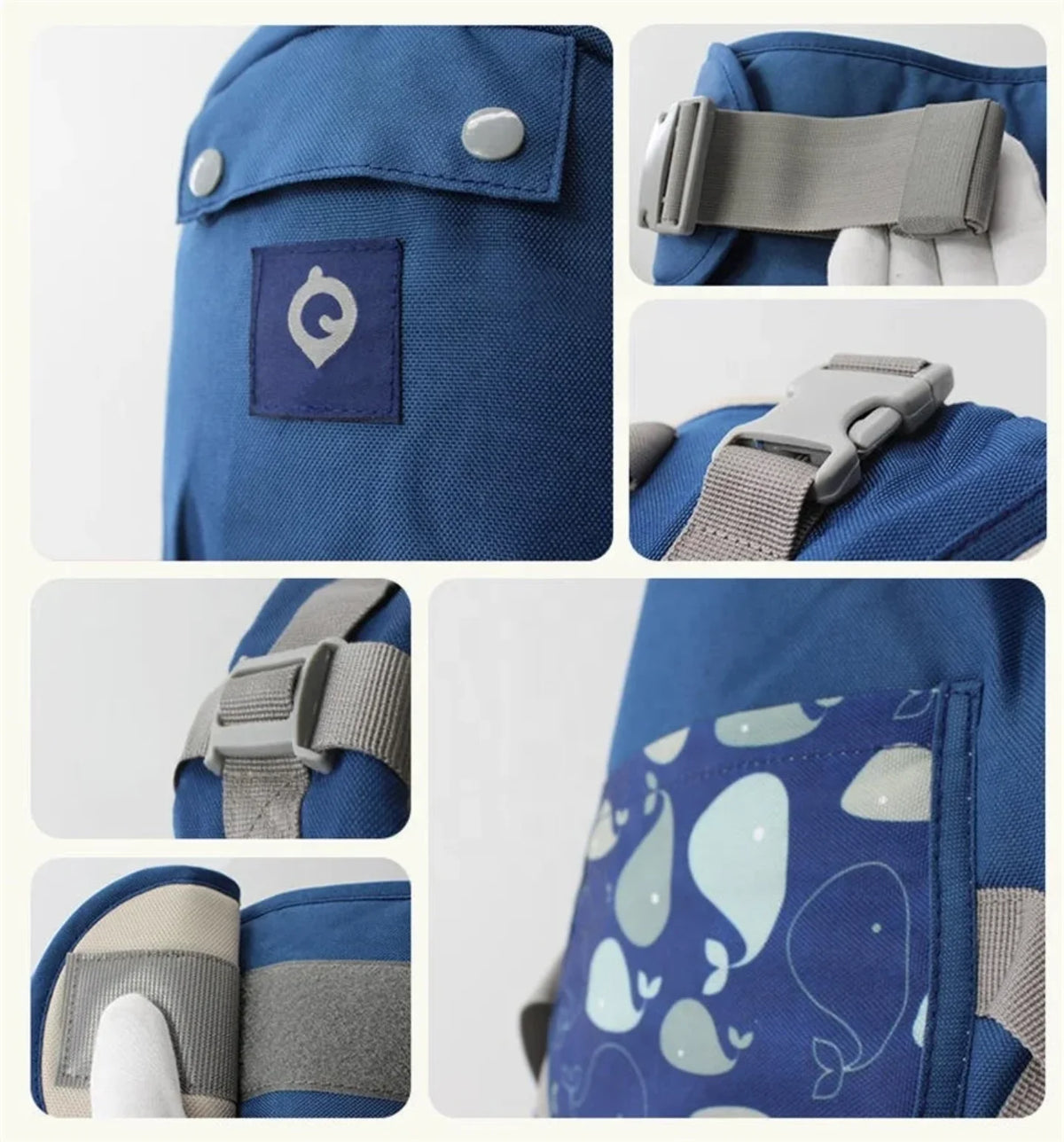 Detalji kopci i traka na plavoj ergonomskoj nosiljci za bebe