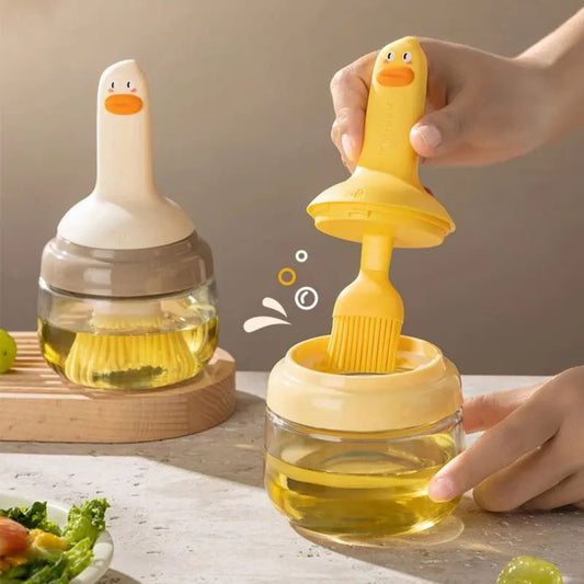 Dozer za ulje sa silikonskom četkicom u obliku patke i staklenom posudom