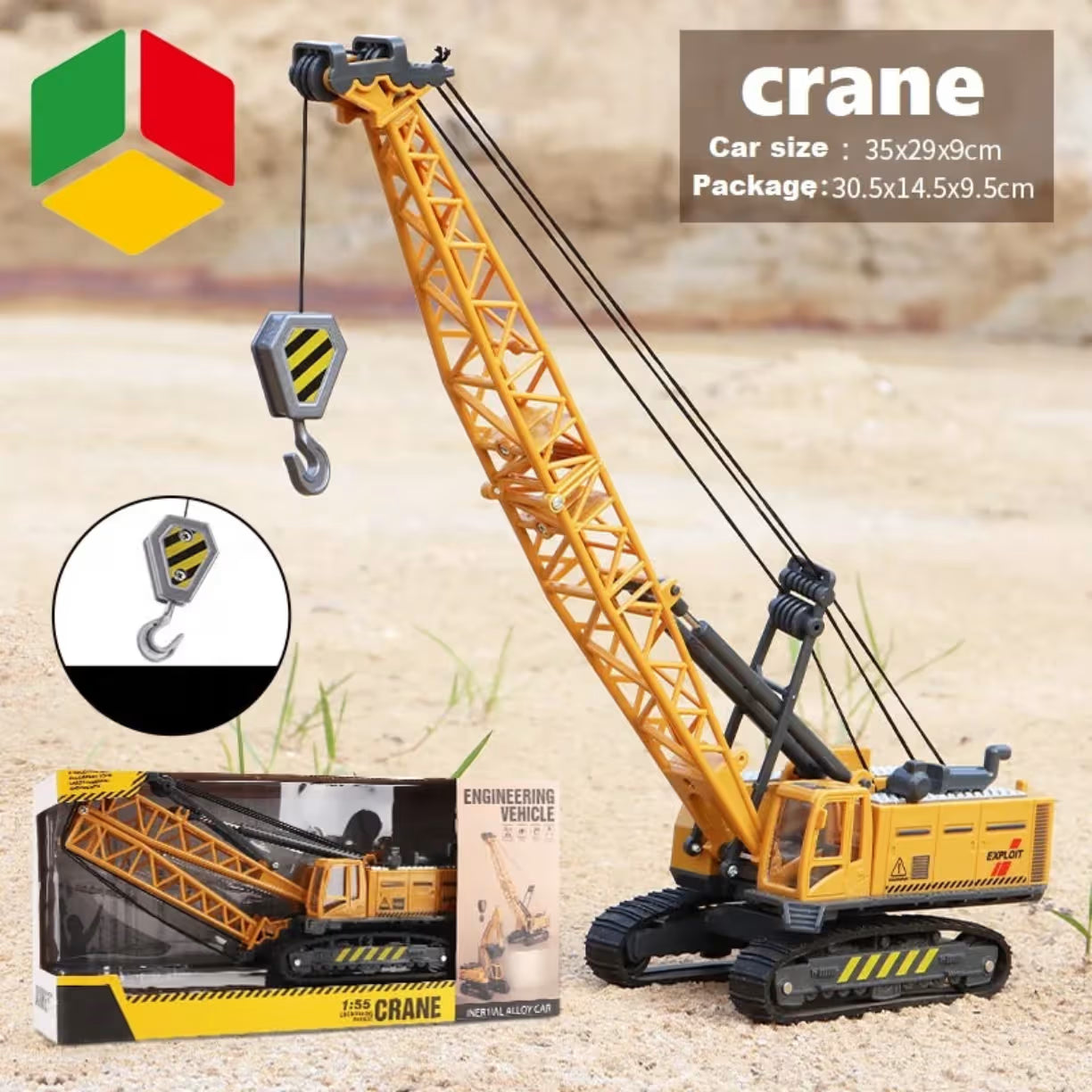 Zuta metalna dizalica na gusenicama sa podignutom kranom na pesku pored originalnog pakovanja