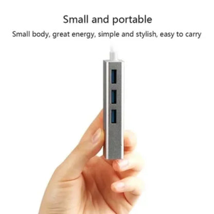 kompaktan usb c hub u ruci korisnika