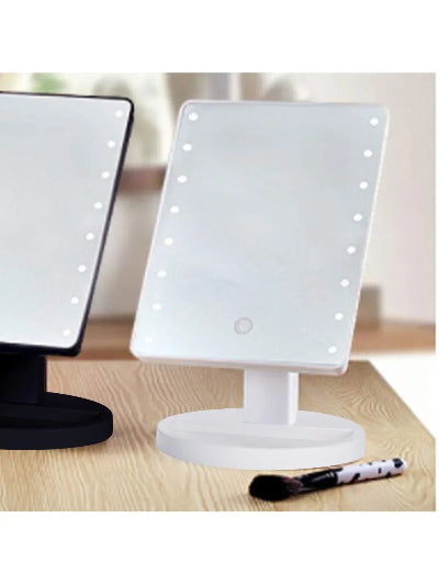 Kompaktno kozmeticko ogledalo sa integrisanim LED svetlima. Savrseno za sto, precizno nanosenje sminke.