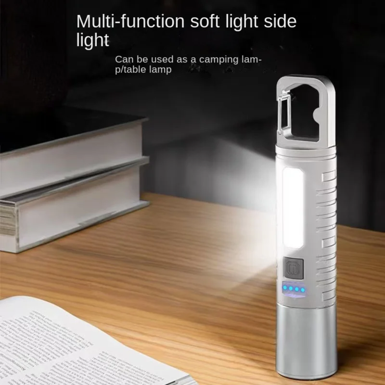 LED mini lampa sa bocnim svetlom na stolu pored knjiga