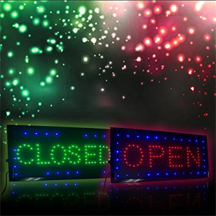 led svetleca tabla sa natpisima open i closed u radu