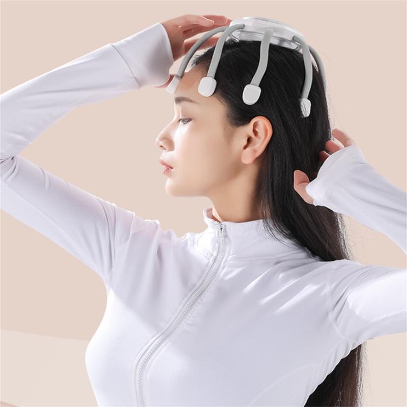 Masaza glave kod kuce pomocu rucnog masazera