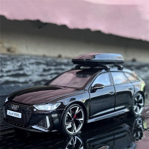 metalni automobil igracka sa krovnim koferom i detaljno izradjenim prednjim delom