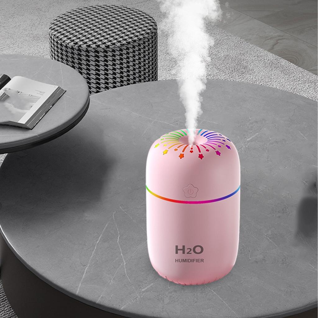 Roze H2O mini ovlazivac vazduha na sivom stocicu