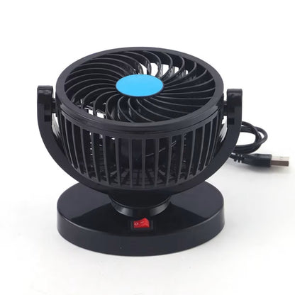 Pogled odozgo na crni ventilator sa istaknutim crvenim prekidacem za paljenje na postolju