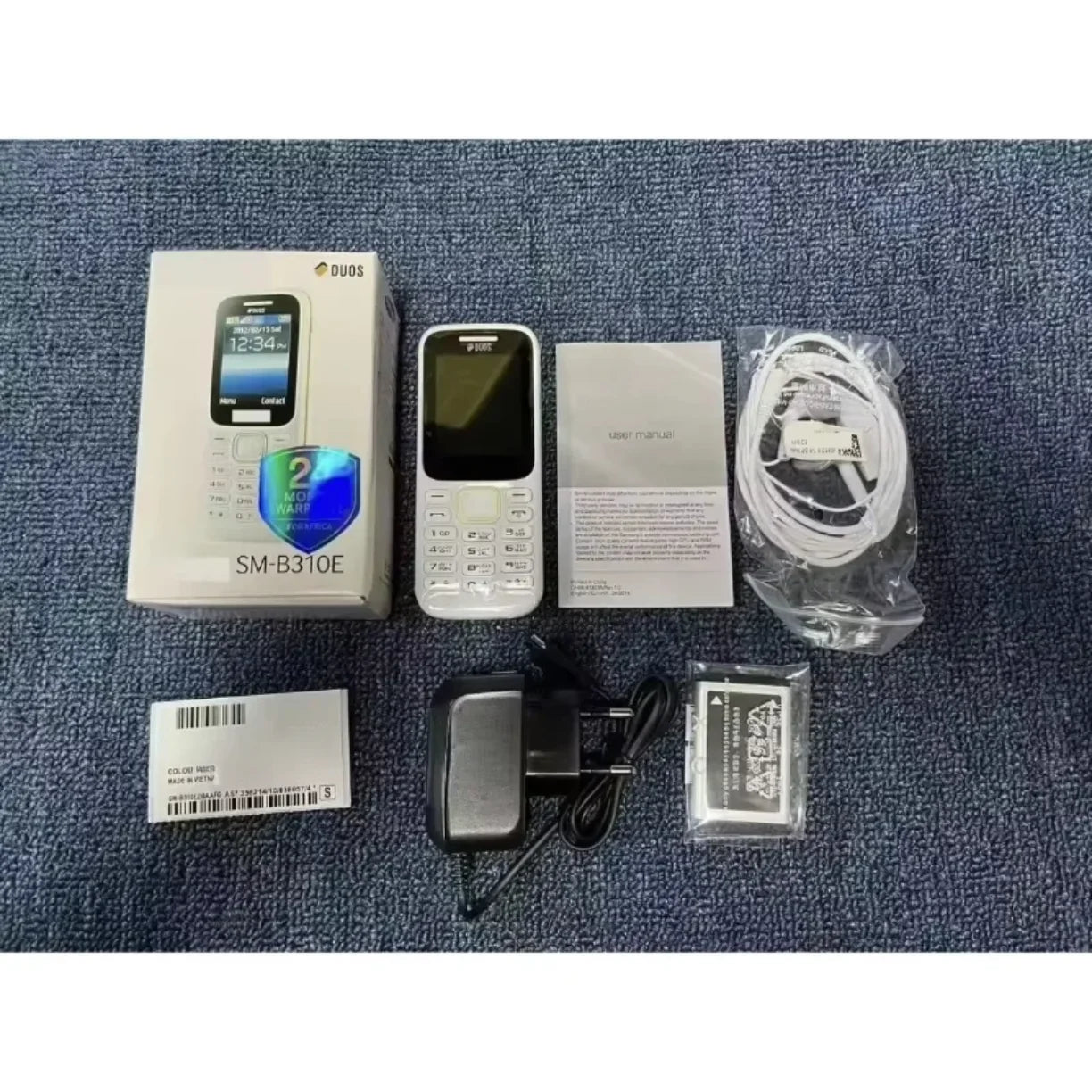 Sadrzaj pakovanja mobilnog telefona B310E punjac baterija i kabl