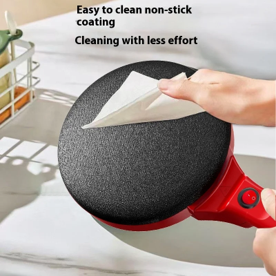 prikaz lakog ciscenja nelepljive povrsine elektricnog tiganja obicnim ubrusom bez ribanja i lepljenja testa nakon upotrebe