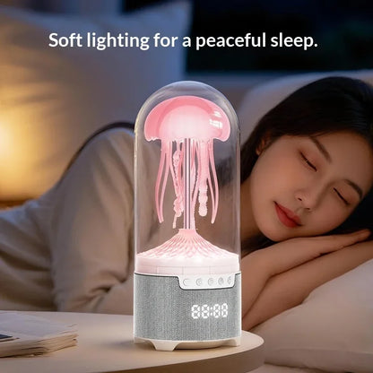 Nocna lampa meduza bluetooth zvucnik pored kreveta sa mekim roze svetlom