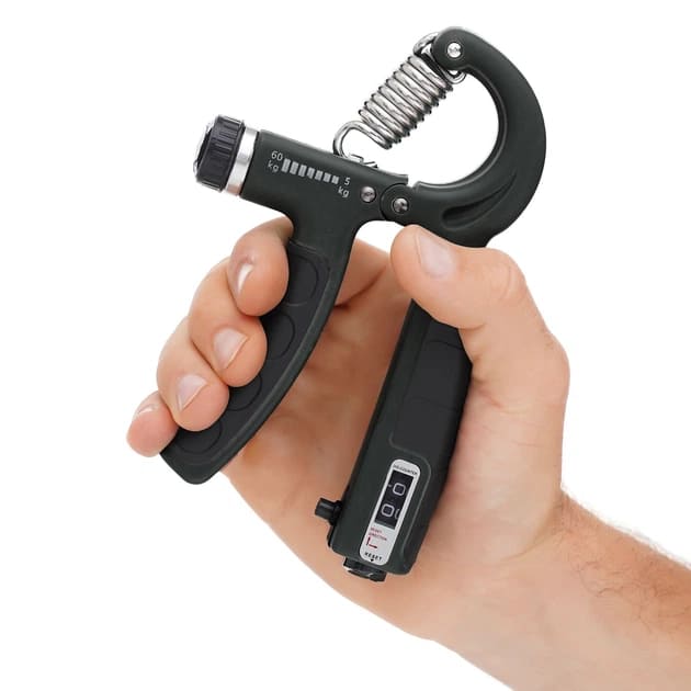 Opruga za saku u realnoj upotrebi tokom treninga za povecanje snage stiska i definiciju misica podlaktice i sake