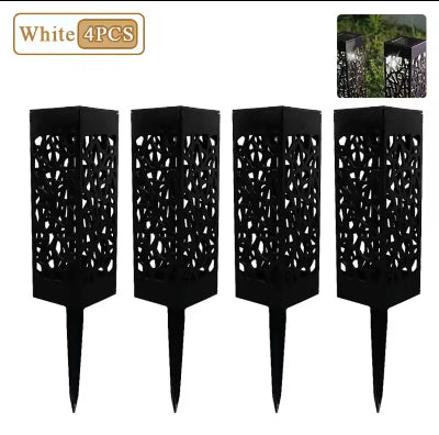 Prikaz seta od cetiri solarne lampe za spoljasnju upotrebu, odlican izbor za osvetljavanje staza, dvorista ili travnjaka.