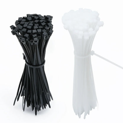 Crne i bele plasticne vezice za kablove u snopovima
