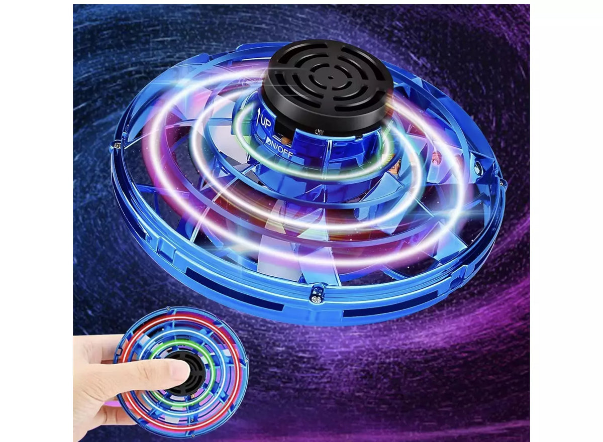 Plavi RGB leteci spiner i ruka koja ga drzi