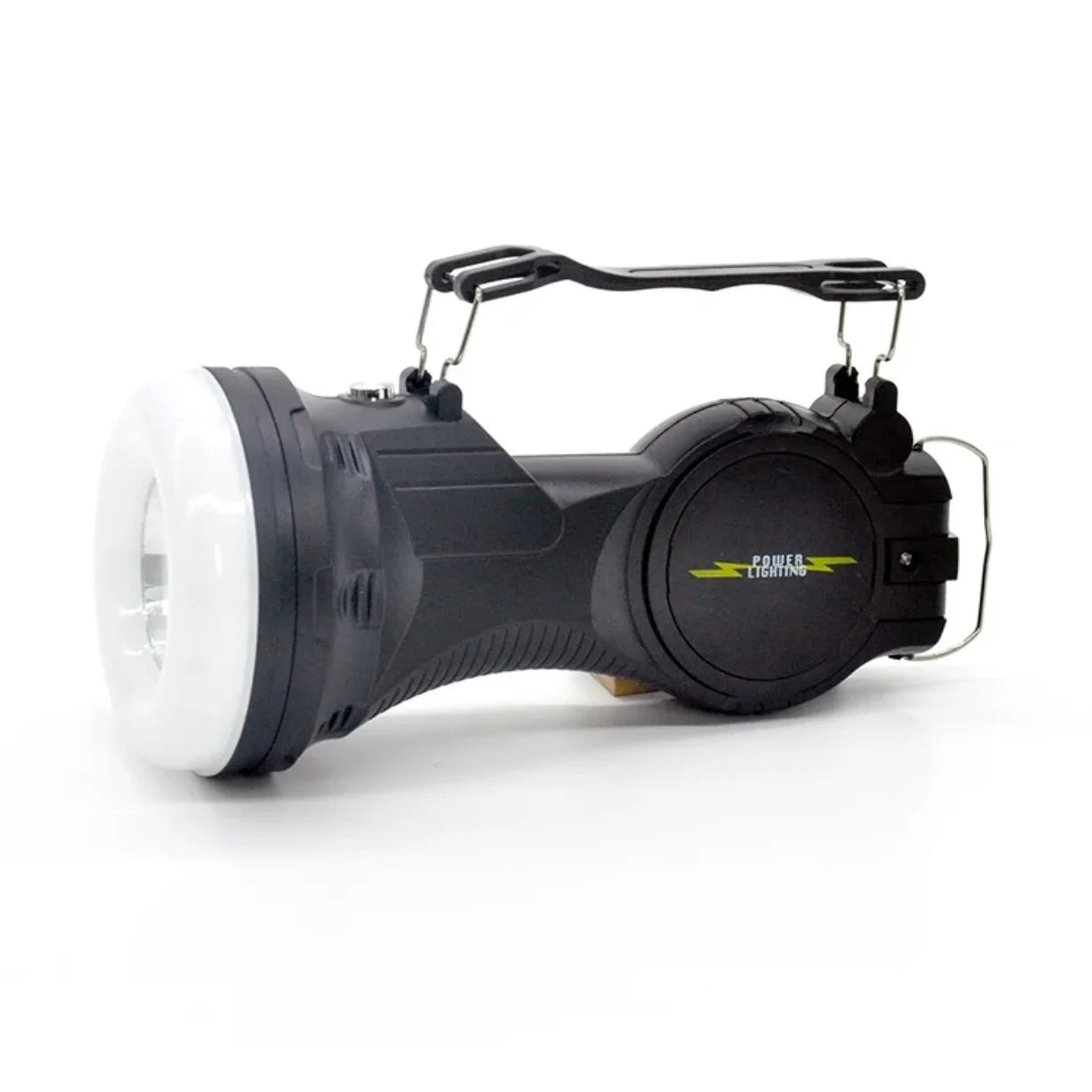 Prenosiva LED kamperska lampa polozena sa ruckom za nosenje