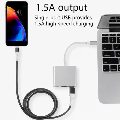 Mobilni telefon povezan kablom na USB port adaptera radi brzog punjenja jacine jedan zarez pet ampera