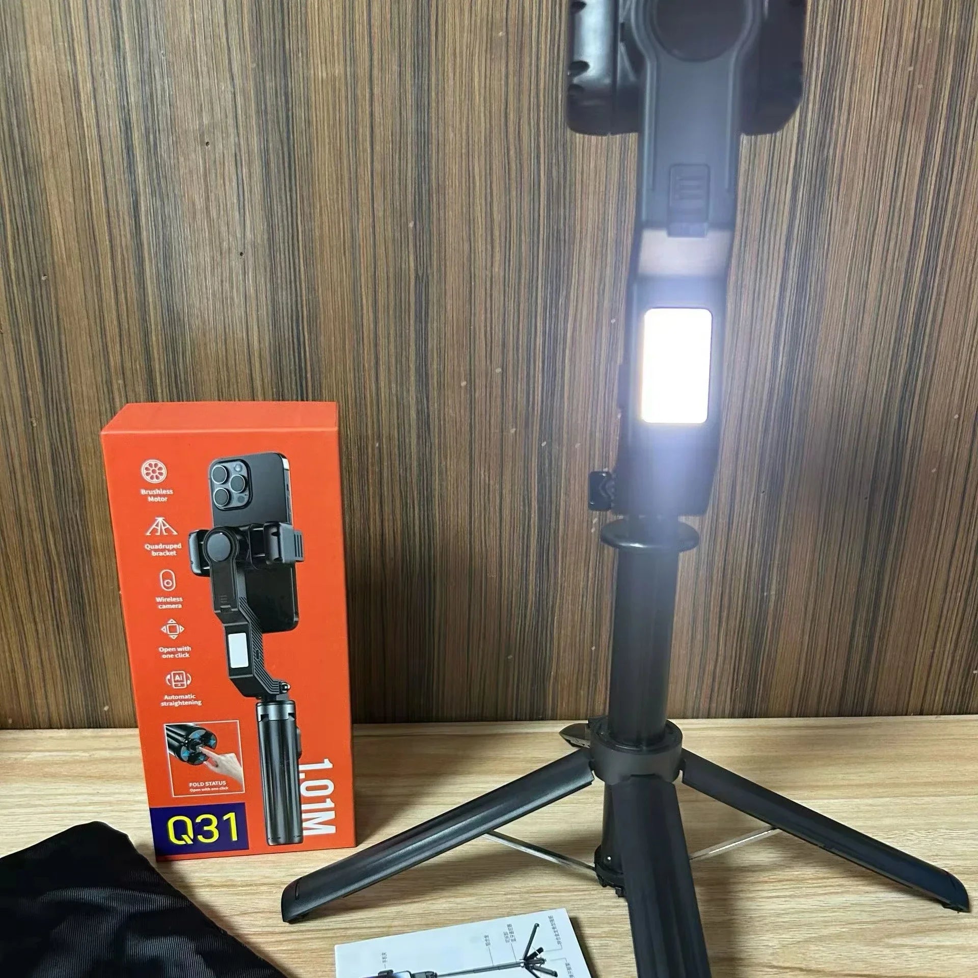 Q31 stabilizator za telefon kao tripod sa ukljucenim LED svetlom