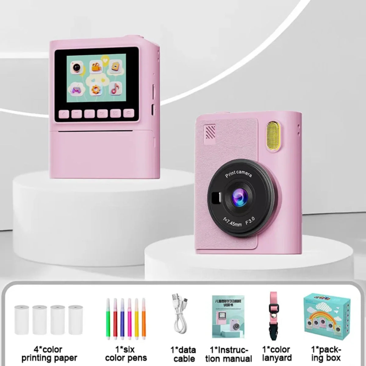 Roze decija instant kamera sa papirima za stampu i dodacima