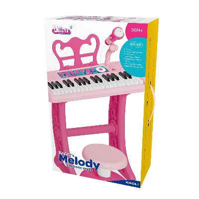 kutija ruzicastog decijeg klavira sa stolicom koja prikazuje sve funkcije karaoke melodije i ritmove za ucenje