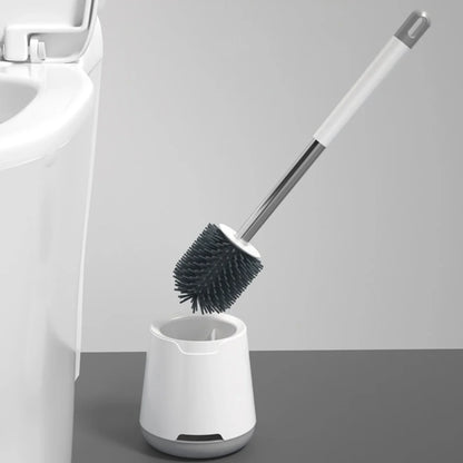 Silikonska cetka za wc solju sa postoljem pored toaleta