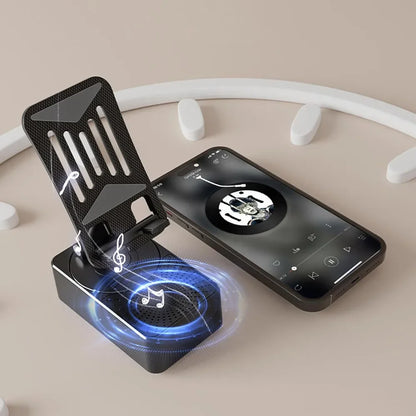 stalak za telefon sa bluetooth zvucnikom na stolu
