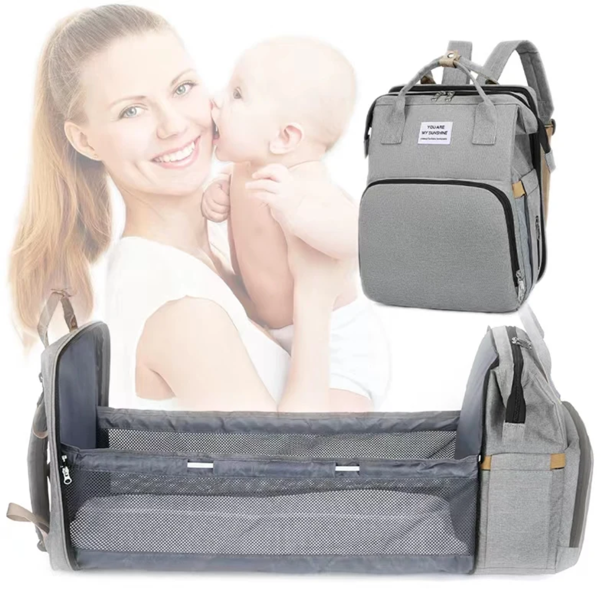 torba za bebe ranac sa krevetcem mama drzi bebu lifestyle slika
